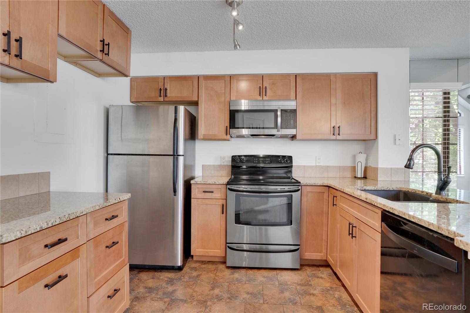 Property Photo: 4802 E Kentucky Avenue CO 80246
