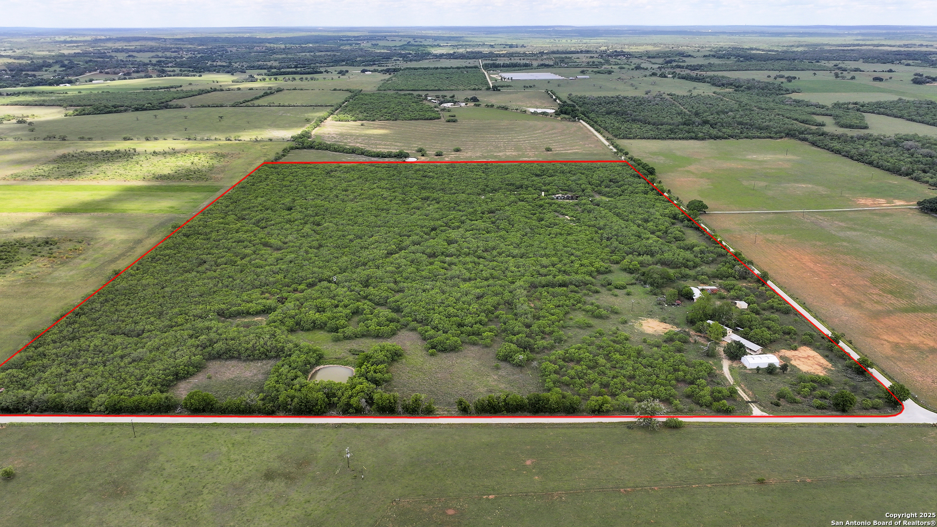 Property Photo: 1702 County Road 116 TX 78140