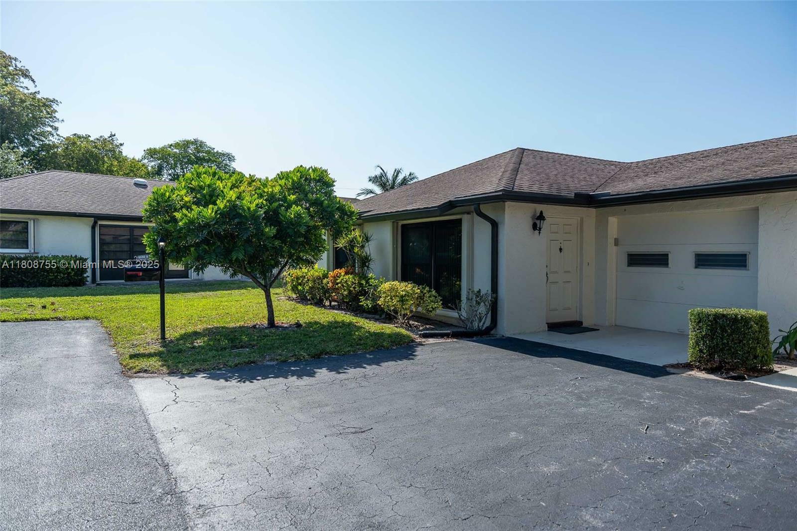 Property Photo:  10198 Dovewood Ln A  FL 33436 