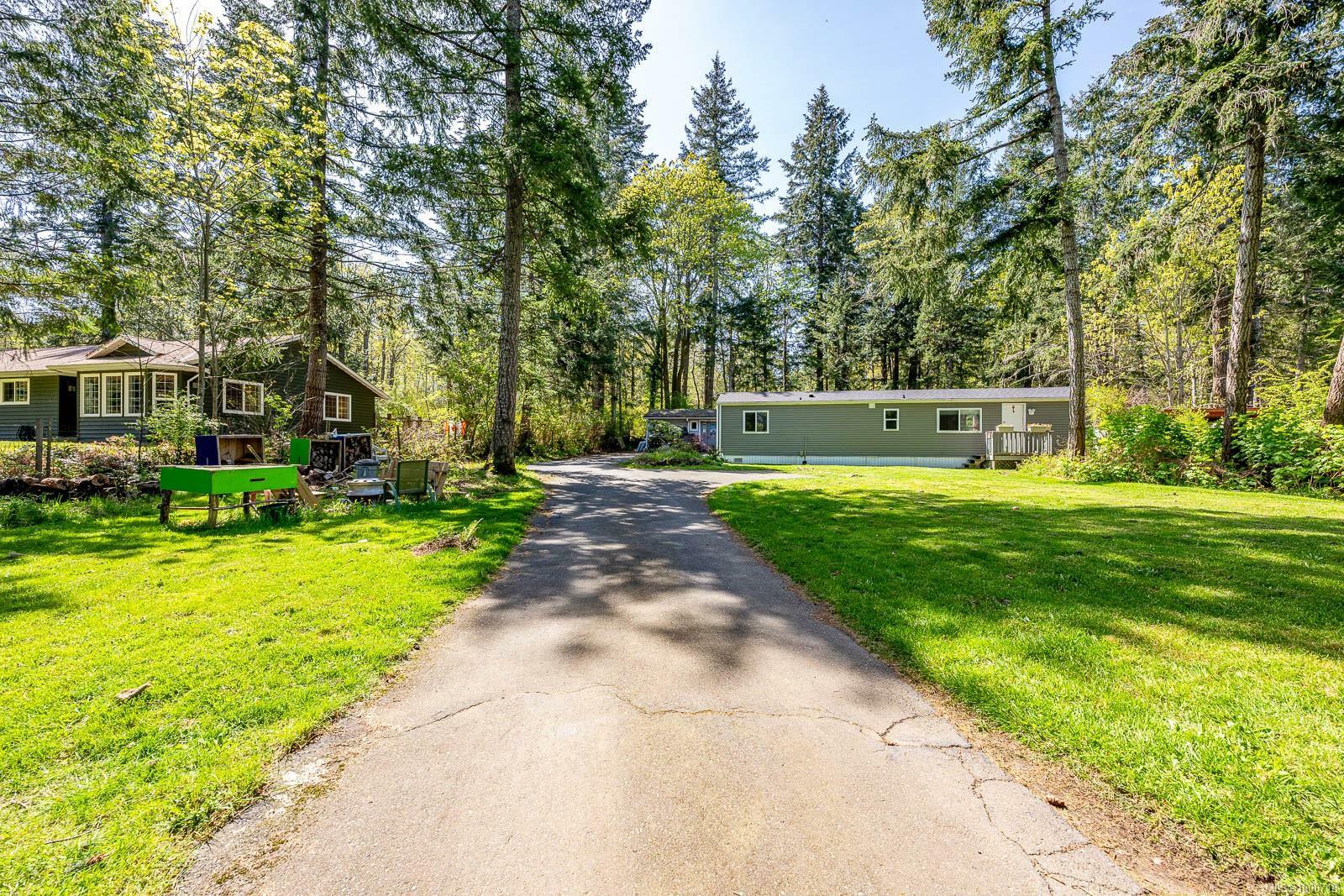 Property Photo: 5895 Bates Rd BC V9J 1W6
