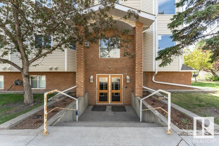 Property Photo:  12205 111 Avenue NW 302  AB T5M 2N2 