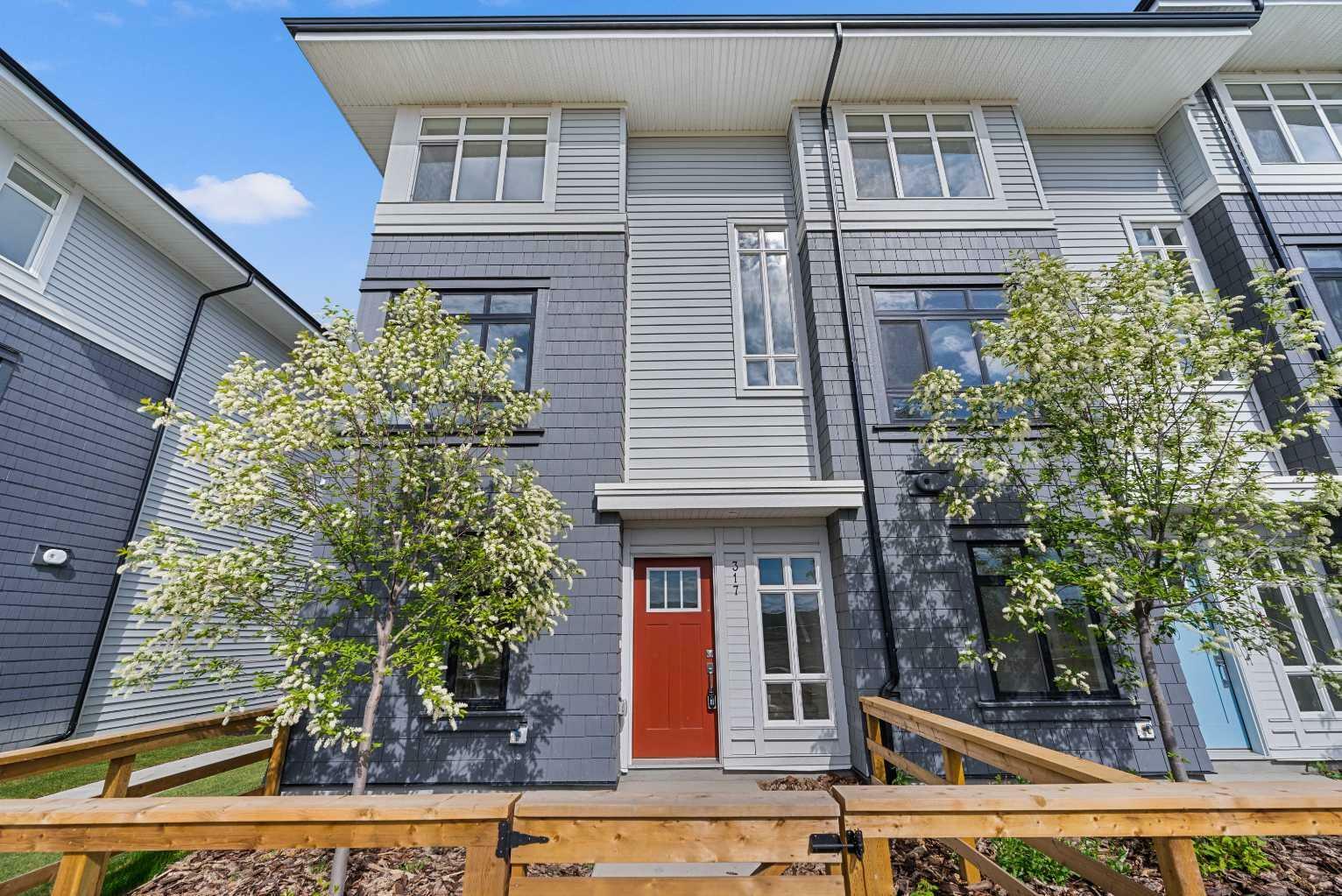Property Photo: 857 Belmont Drive SW 317 AB T2X 4P2