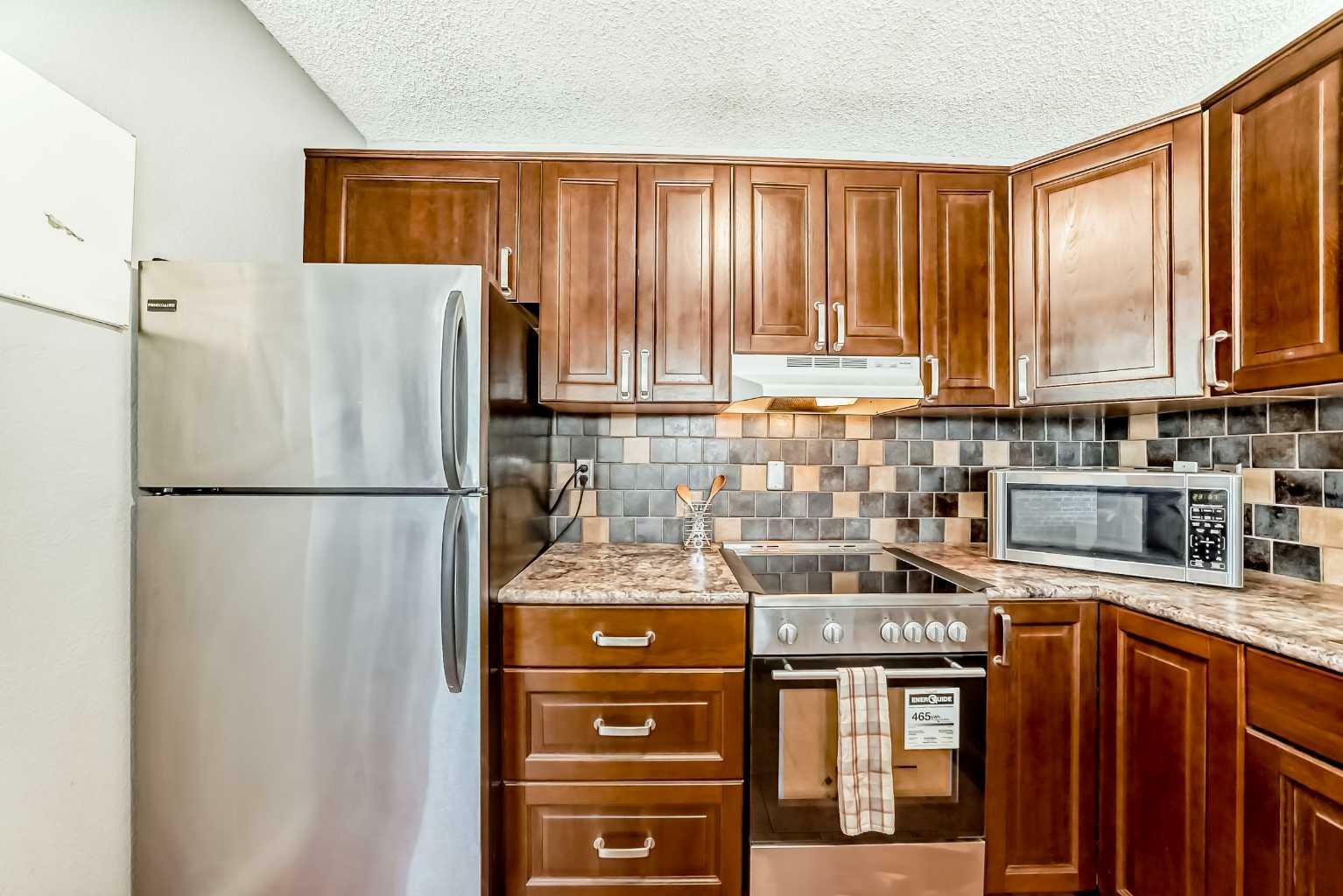 Property Photo: 809 4 Street NE 302 AB T2E 3S9