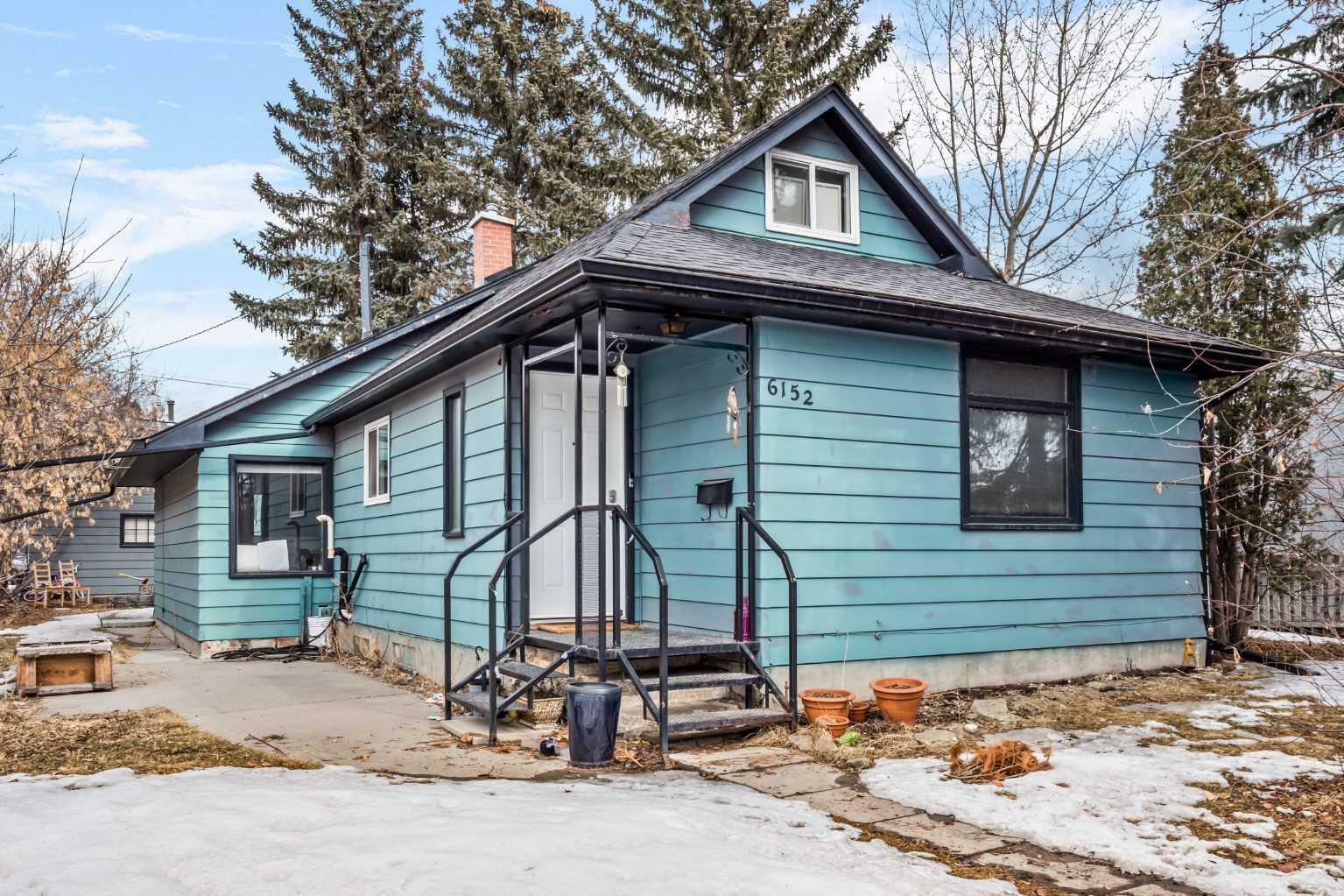 Property Photo: 6152 Bowwood Drive NW AB T3B 2E9