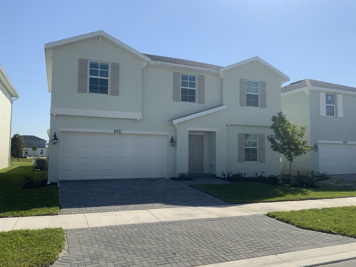 Property Photo:  6731 NW Windwood Way  FL 34987 