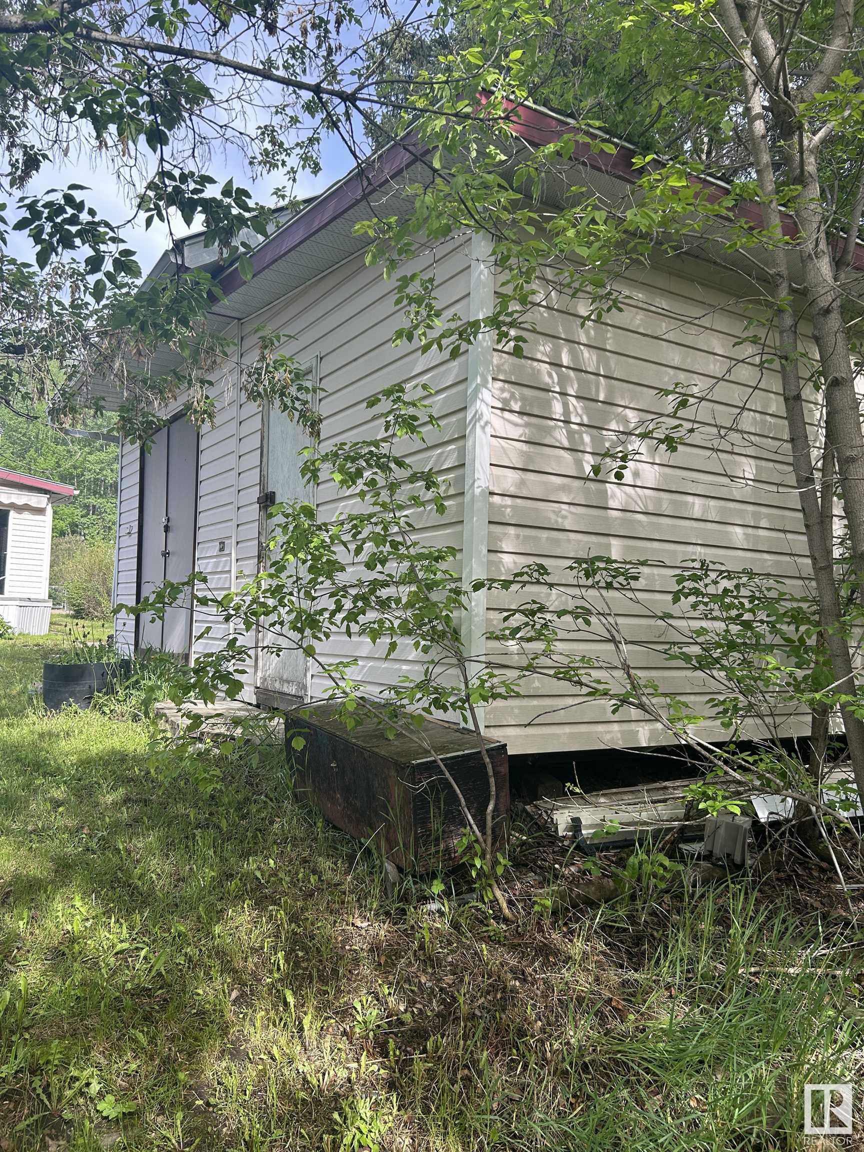 Property Photo: 147 Cedar Glen AB T0C 1W0