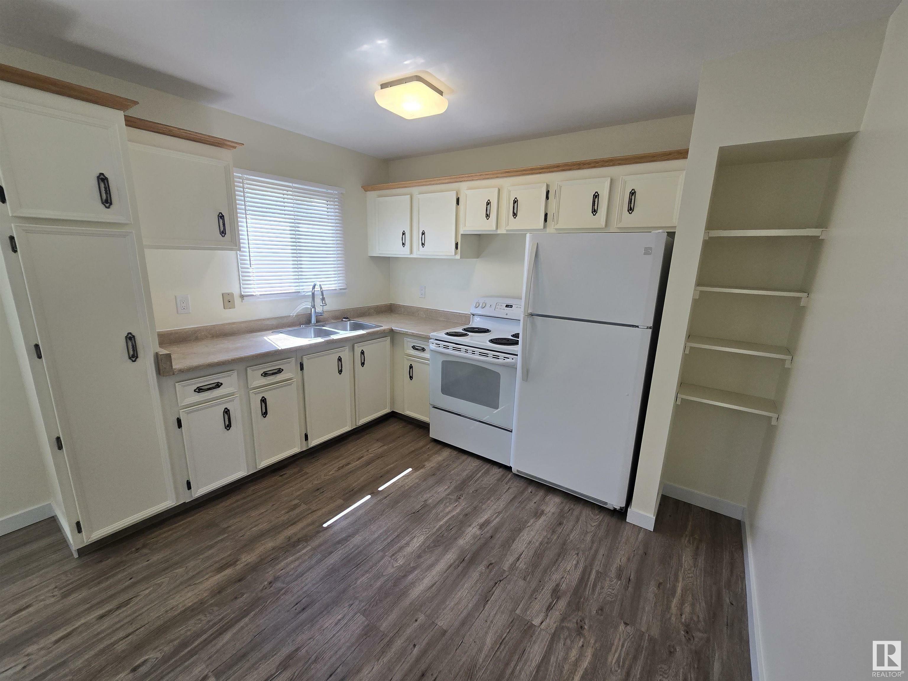 Property Photo: 14047 30 Street NW AB T5Y 1R5
