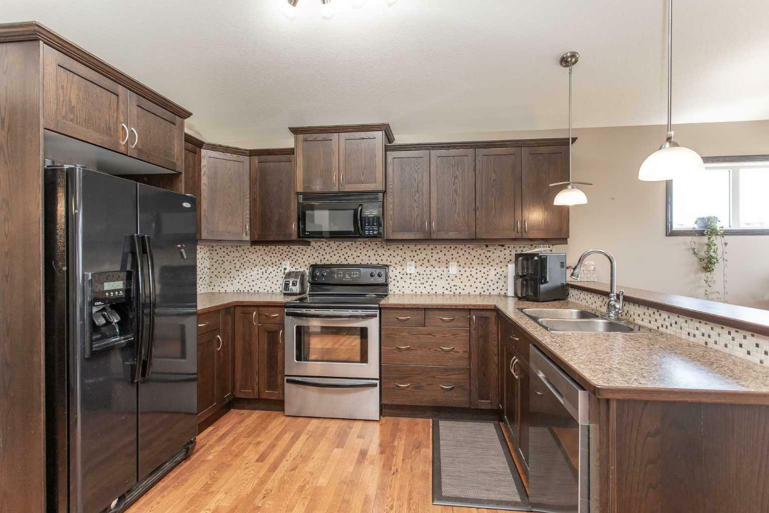 Property Photo: 56 Mackenzie Crescent AB T4S 1X6