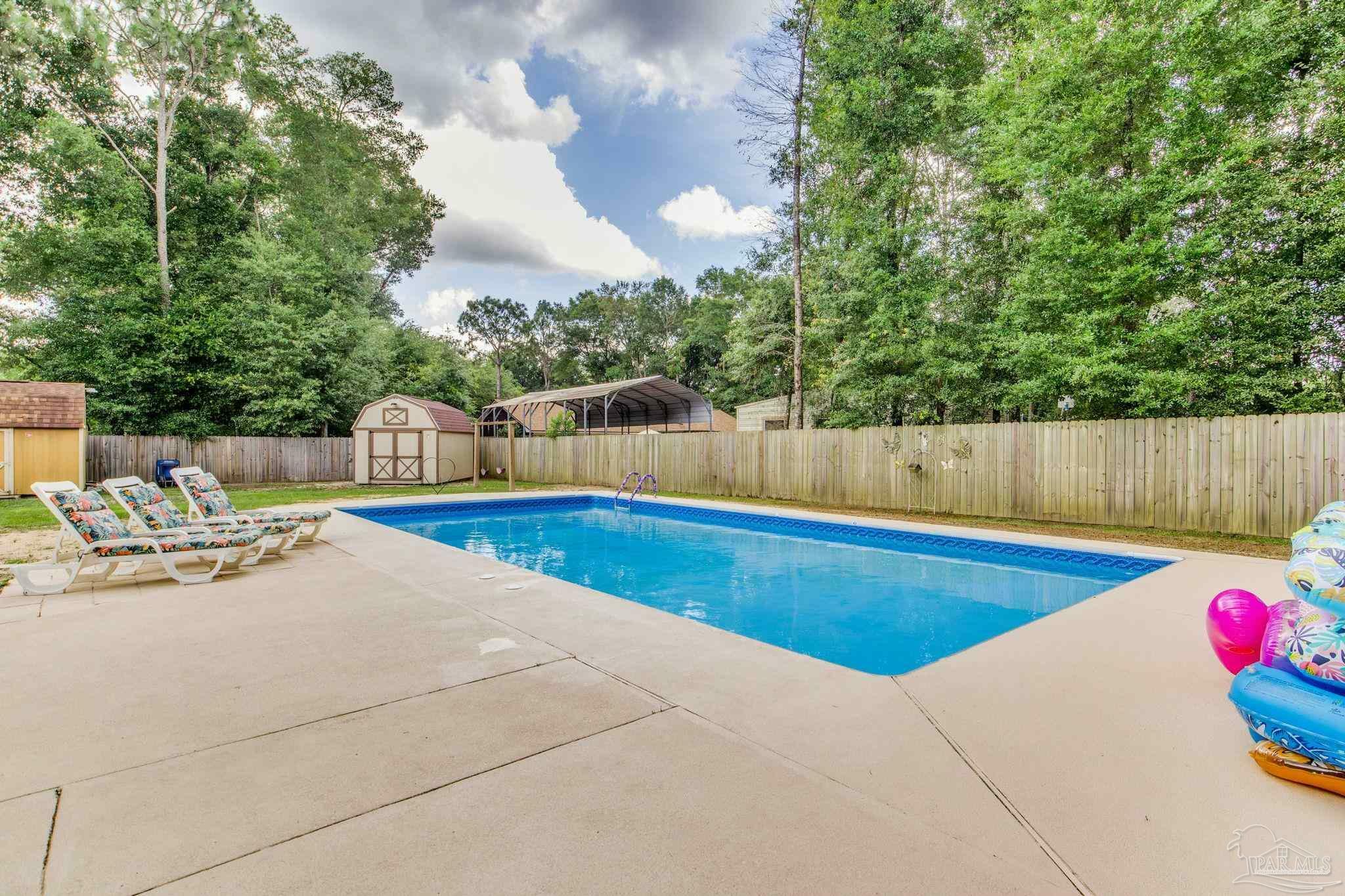 Property Photo: 5945 Pamela Dr FL 32570