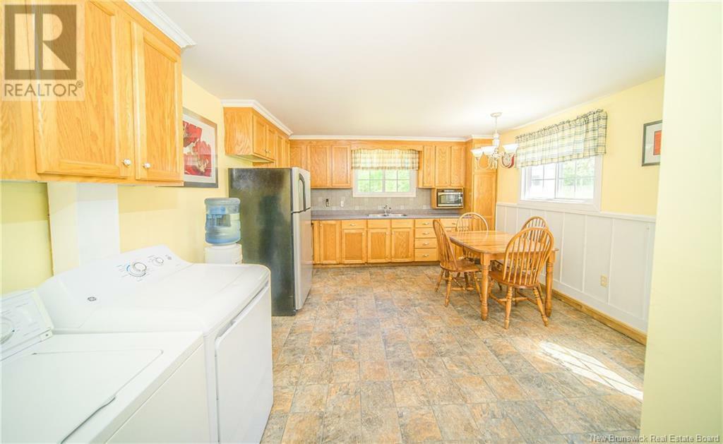 Property Photo: 205 Riverside Drive NB E5L 1W1