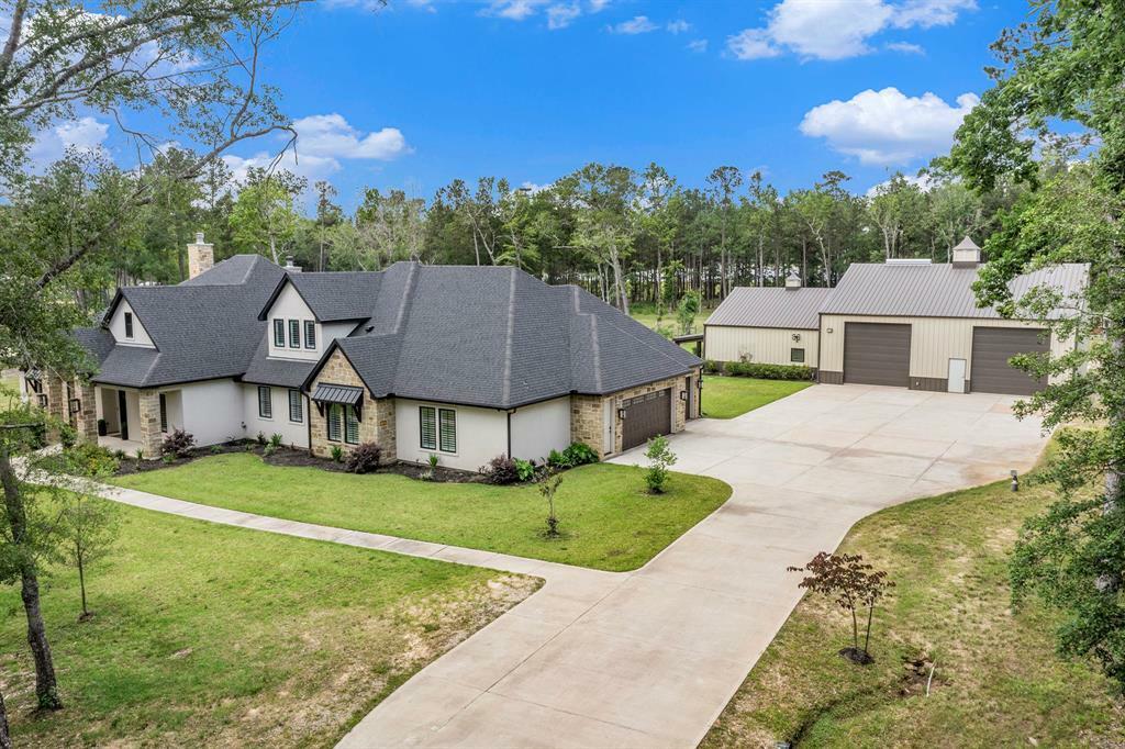 Property Photo: 10102 Woodlane Boulevard TX 77354