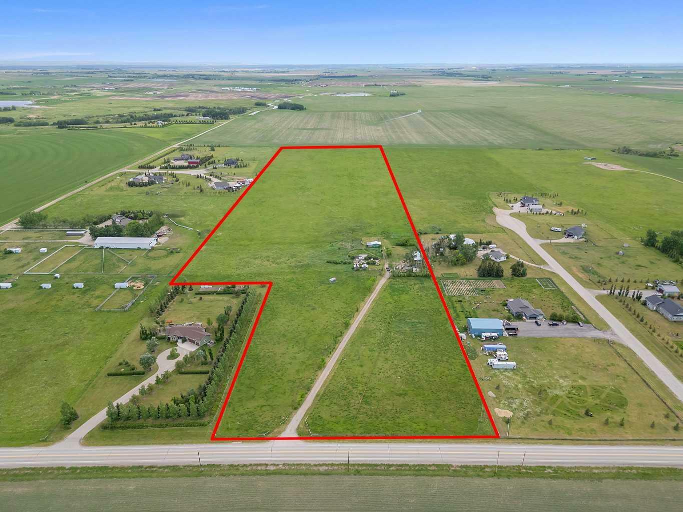 Property Photo:  254015 Township 240 Road  AB T1P 1J6 