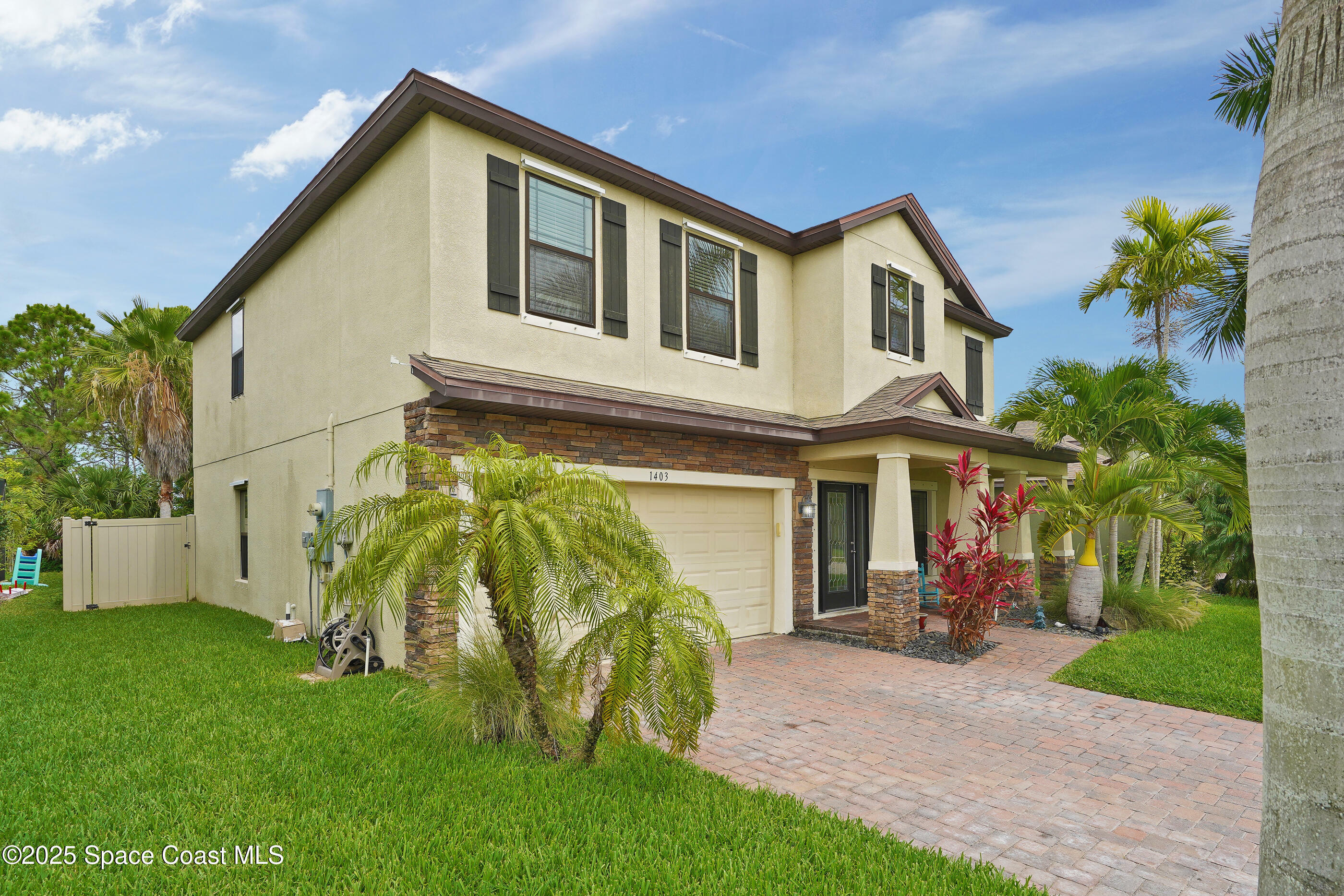 Property Photo: 1403 Musgrass Circle FL 32904
