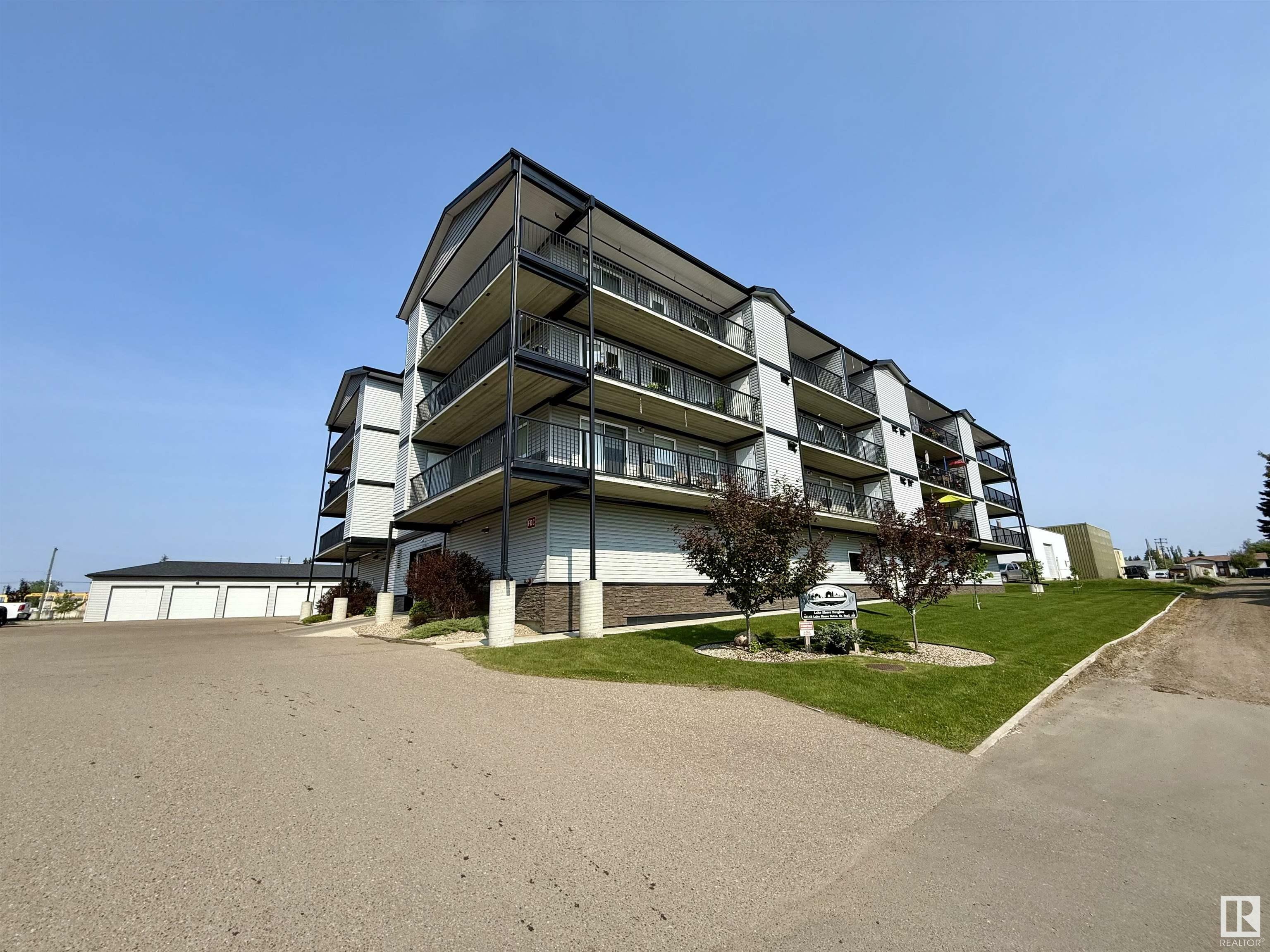 Property Photo: 4614B Lakeshore Drive 201 AB T0A 3A3