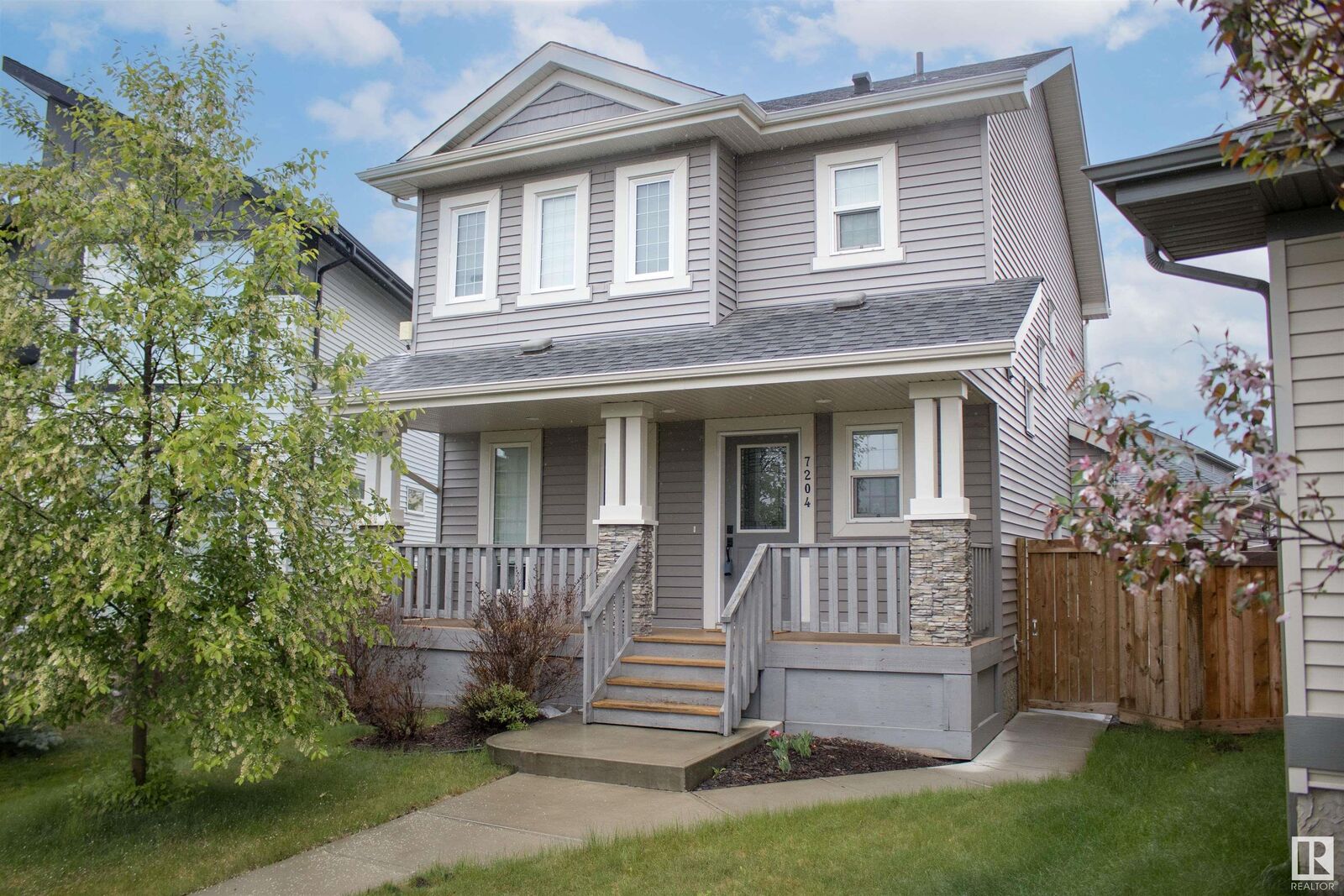 Property Photo: 7204 Cardinal Way SW AB T6W 2Y5