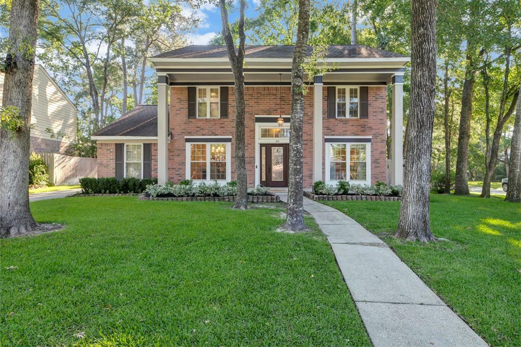 Property Photo: 38 Fire Flicker Place TX 77381