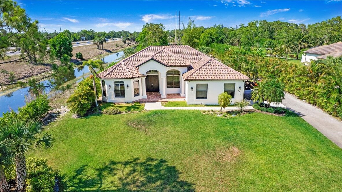 Property Photo:  6341 Green Boulevard  FL 34116 