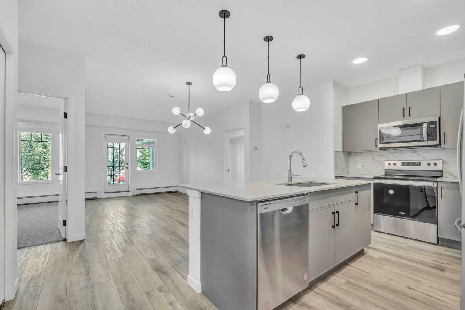 Property Photo: 140 Mahogany Street SE 113 AB T3M 3H4