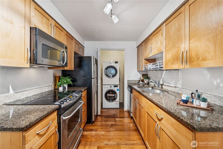 Property Photo:  3045  20th Avenue W 107  WA 98199 
