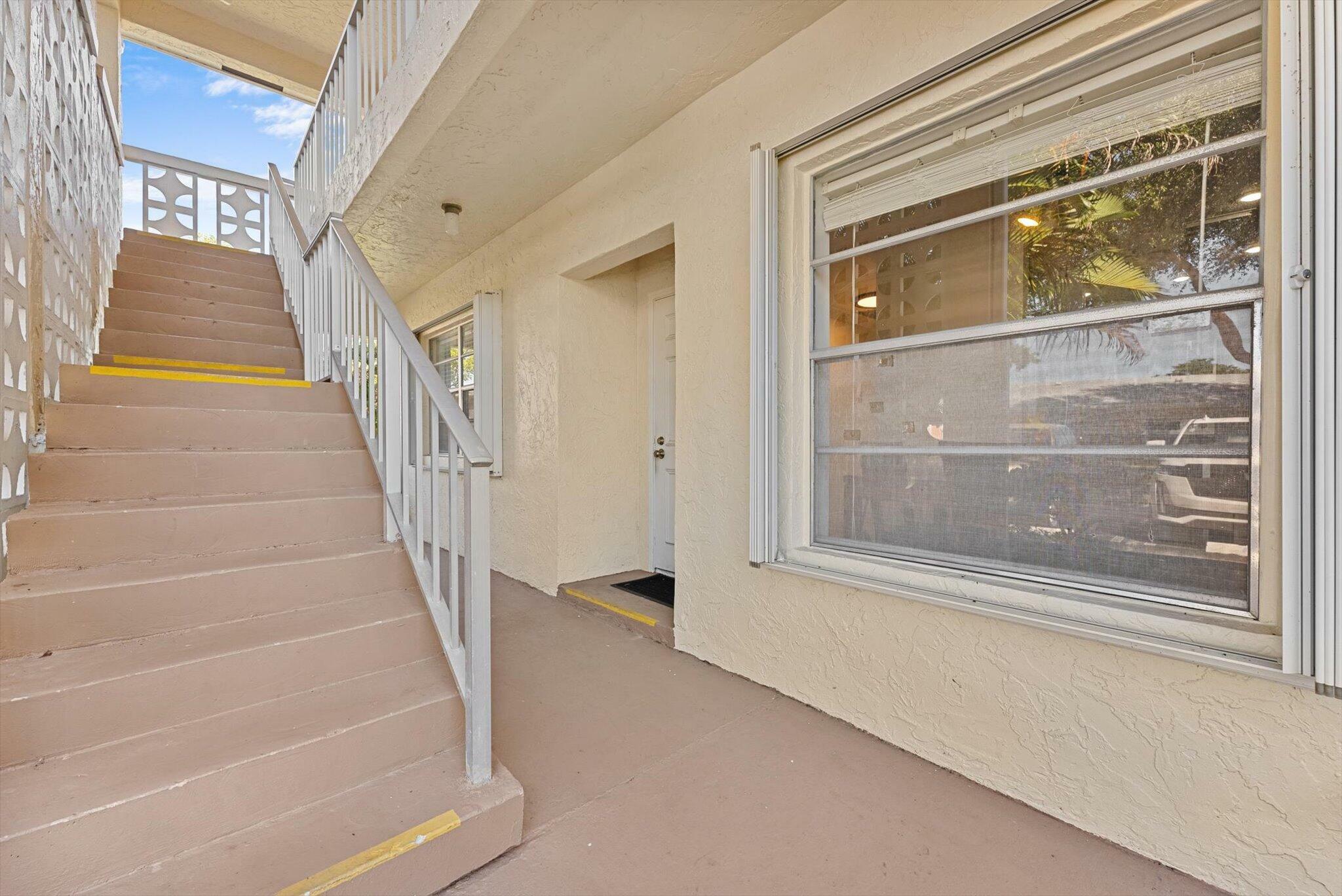 Property Photo:  1560 NW 18th Avenue 101  FL 33445 