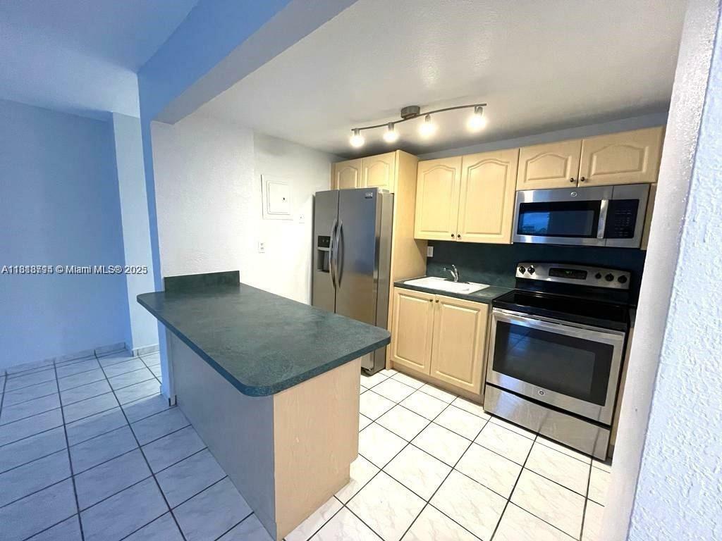 Property Photo: 4275 NW South Tamiami Canal Dr 2-108 FL 33126