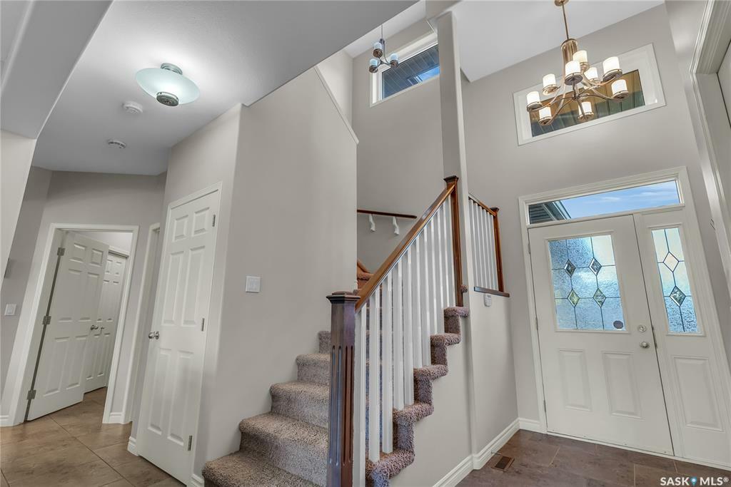 Property Photo: 202 Robertson Cove SK S7T 0E3
