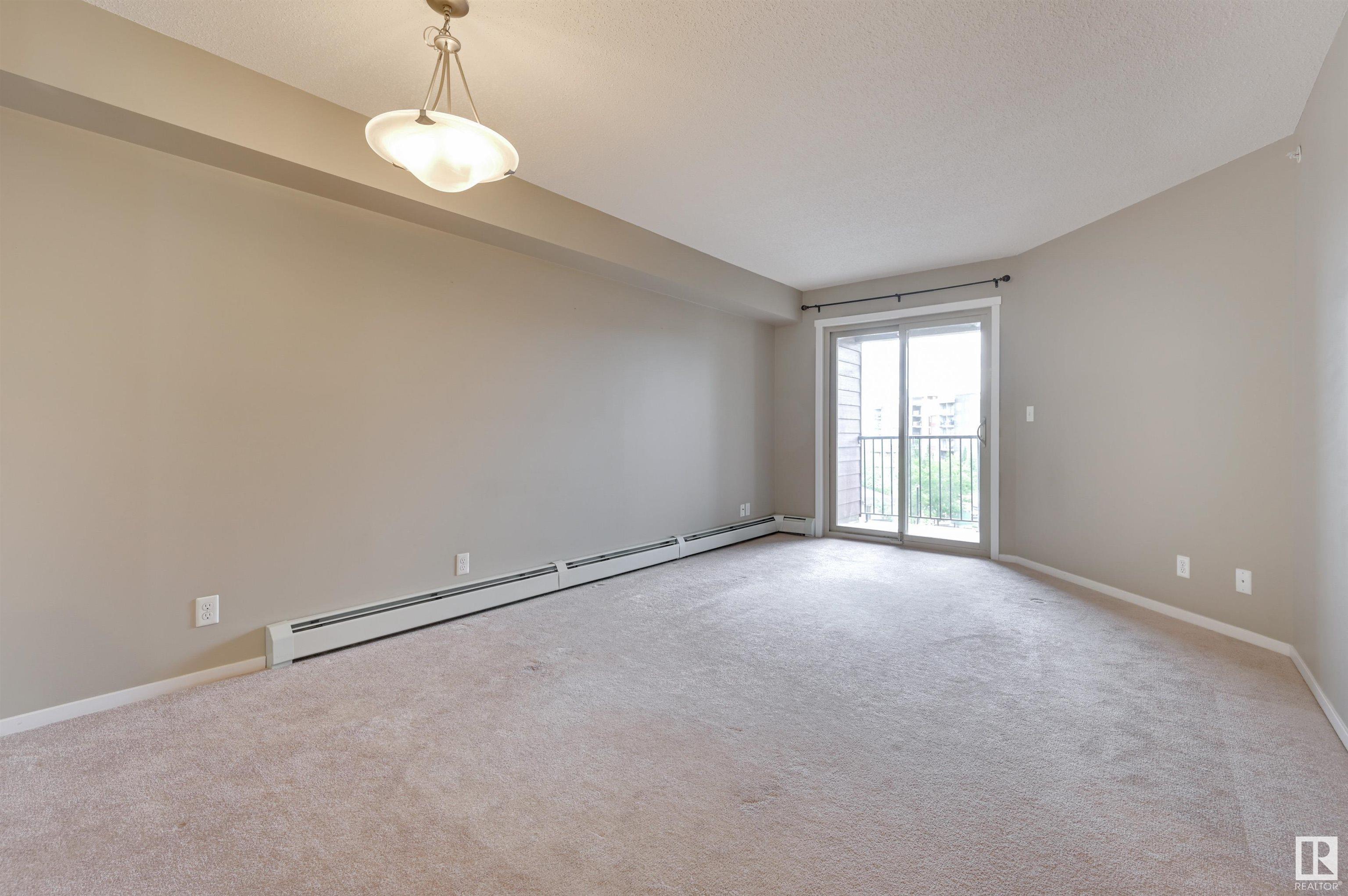 Property Photo: 3315 James Mowatt Trail SW 422 AB T6W 3L9