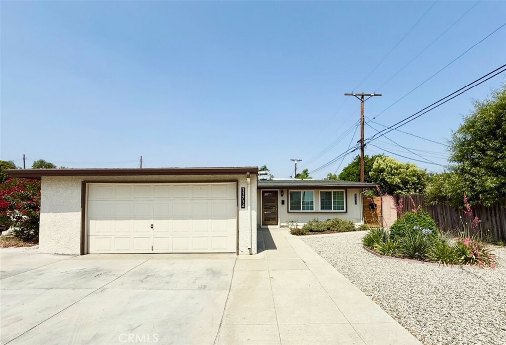 Property Photo:  11714 Sproule Avenue  CA 91331 