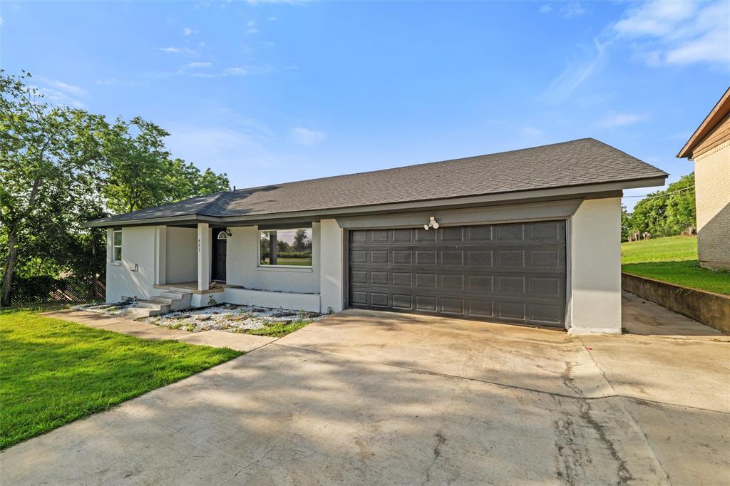 Property Photo: 421 E Tarrant Road TX 75050