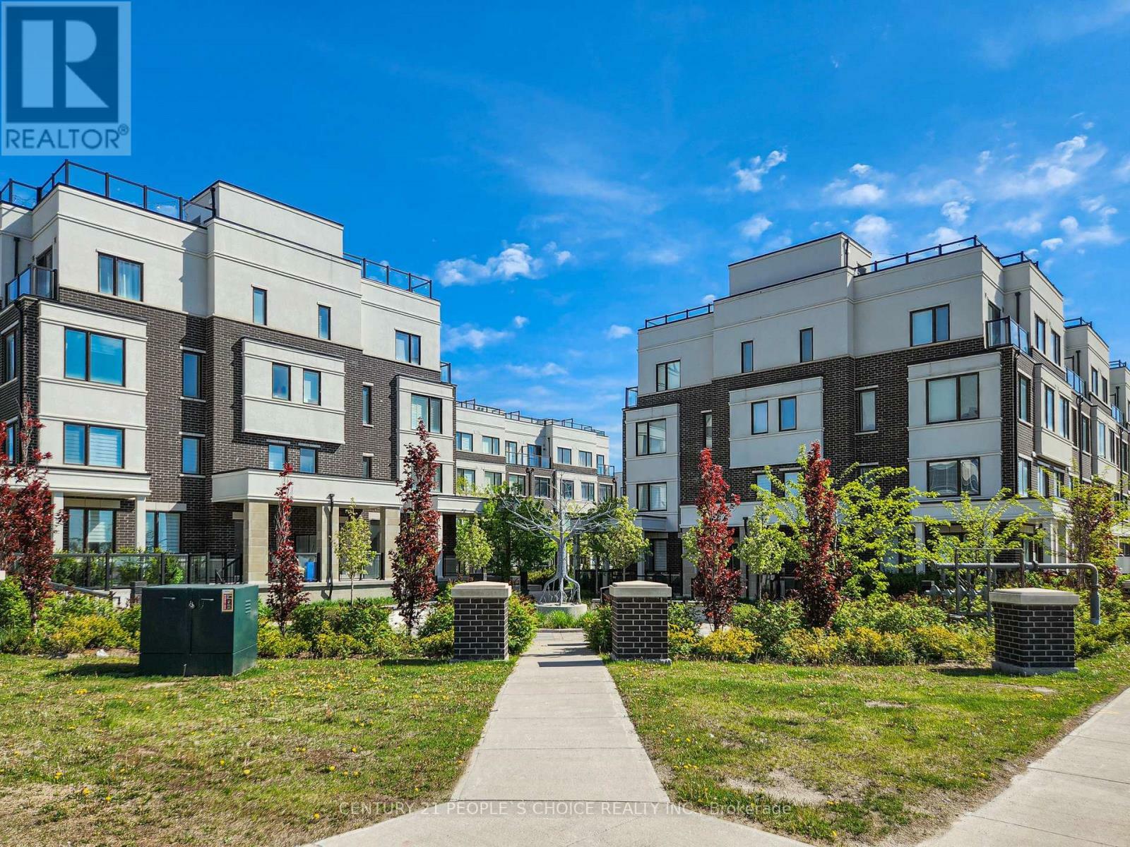 Property Photo: 1711 Pure Springs Boulevard 122 ON L1X 0E3