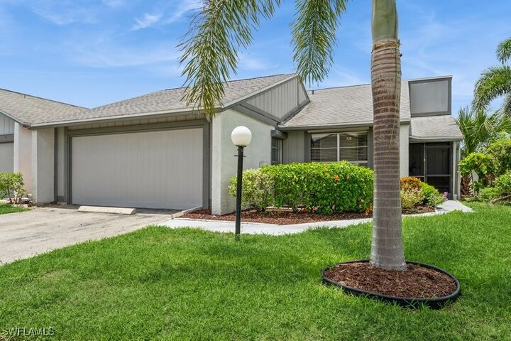 Property Photo:  9749 Maplecrest Circle  FL 33936 