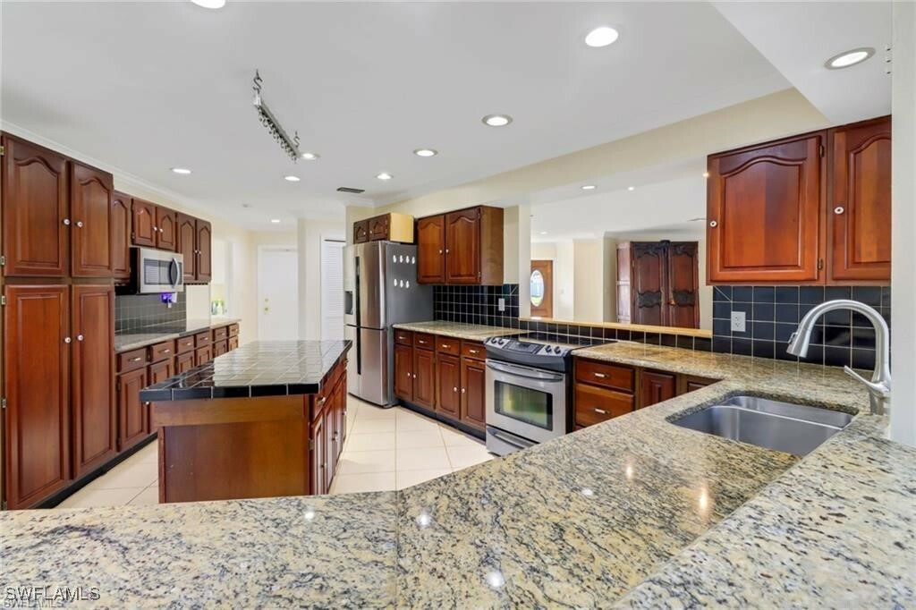 Property Photo: 449 Cypress Way E FL 34110