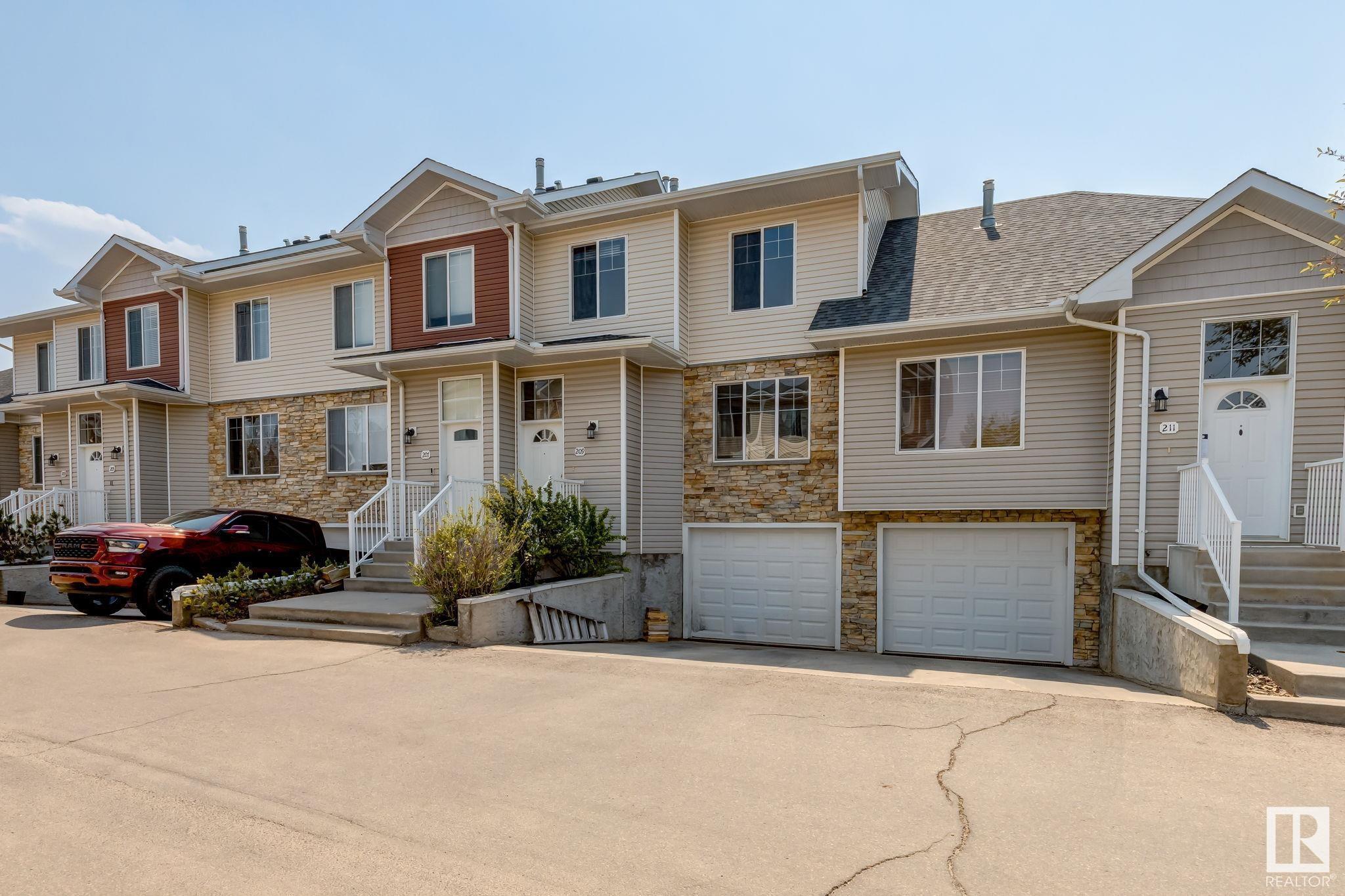 Property Photo: 178 Bridgeport Boulevard 209 AB T9E 8S8