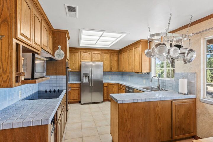 Property Photo:  15805 Uvas Road  CA 95037 