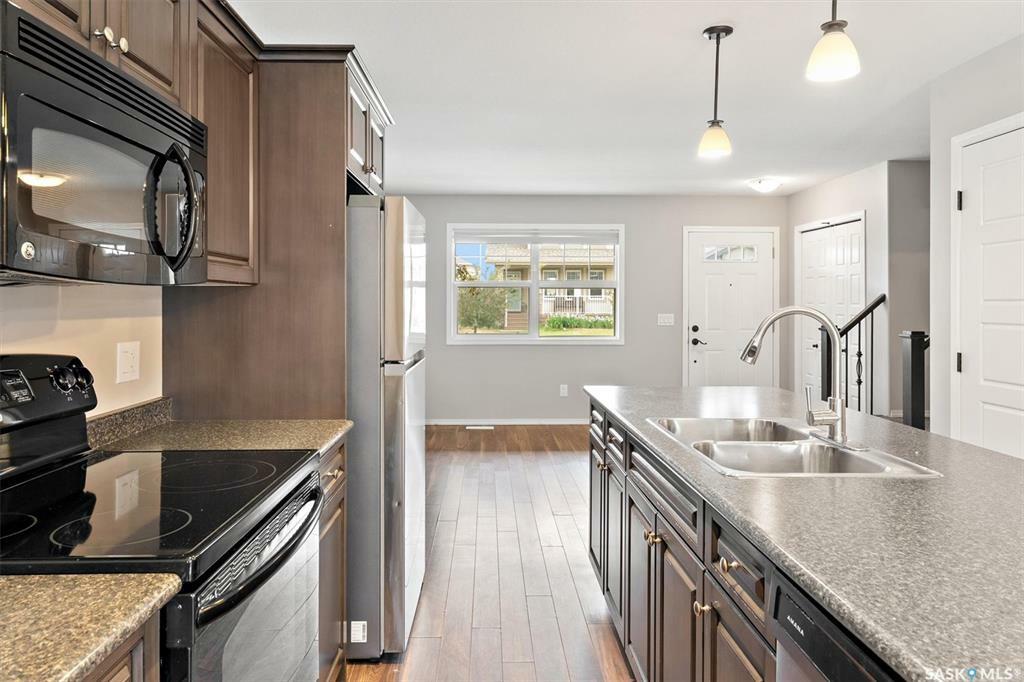 Property Photo: 212 Langlois Way SK S7T 0L2