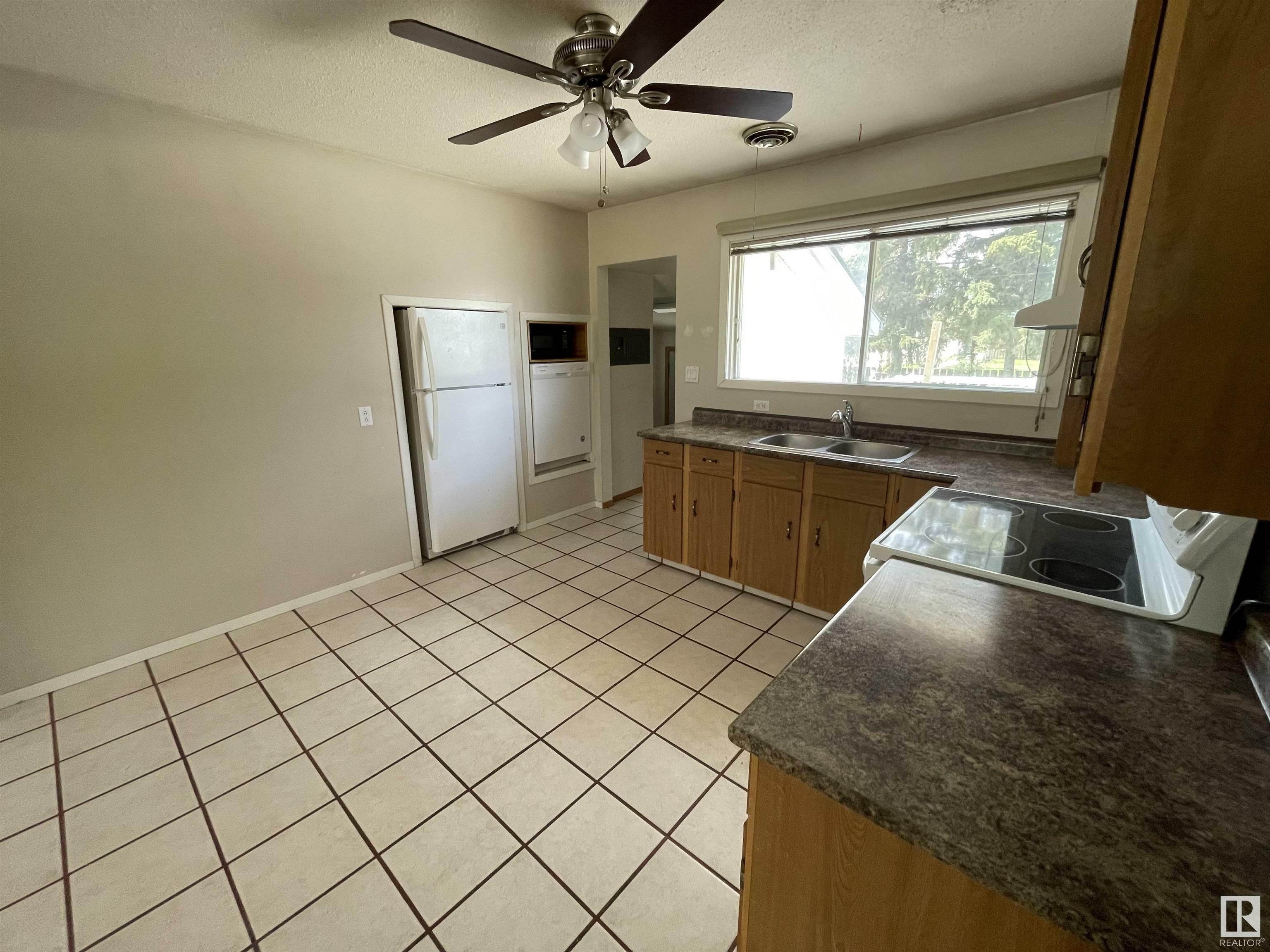 Property Photo: 4904 47 Street AB T7A 1H8