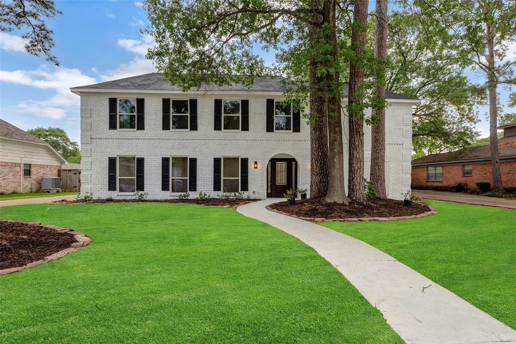 Property Photo: 7707 12th Fairway Lane TX 77346