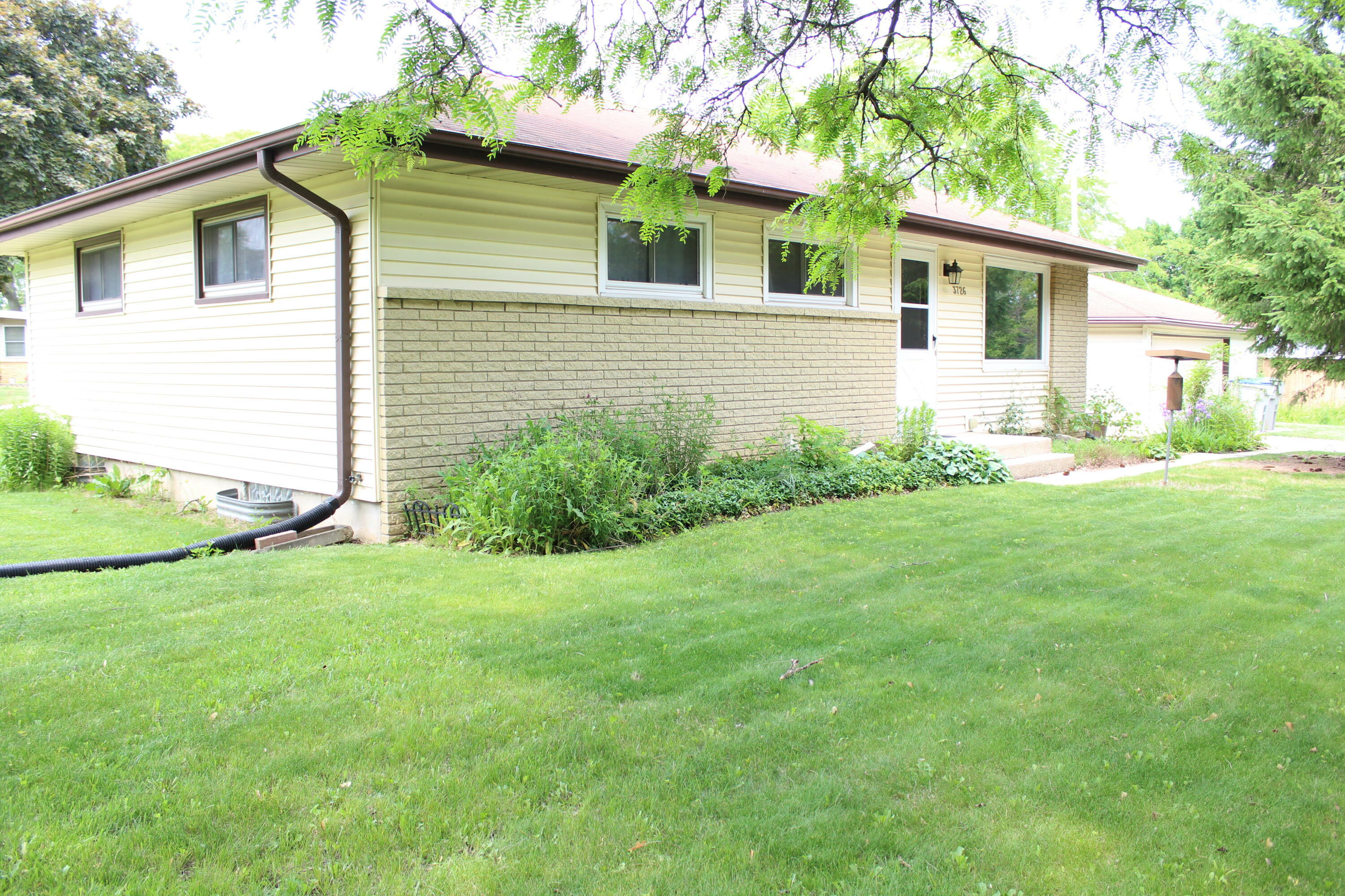 Property Photo: 3726 W Birchwood Ave WI 53221