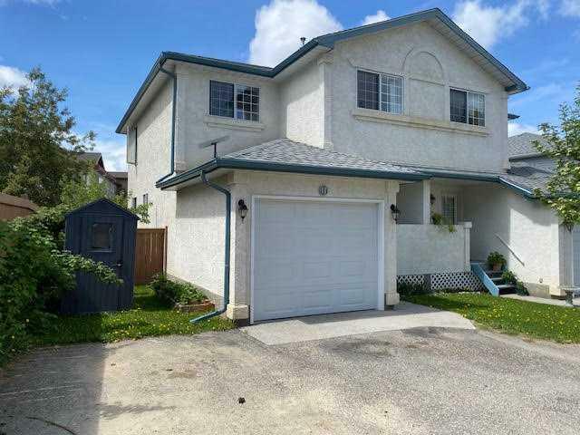 Property Photo: 465 Makenny Street 11 AB T7V 1H3