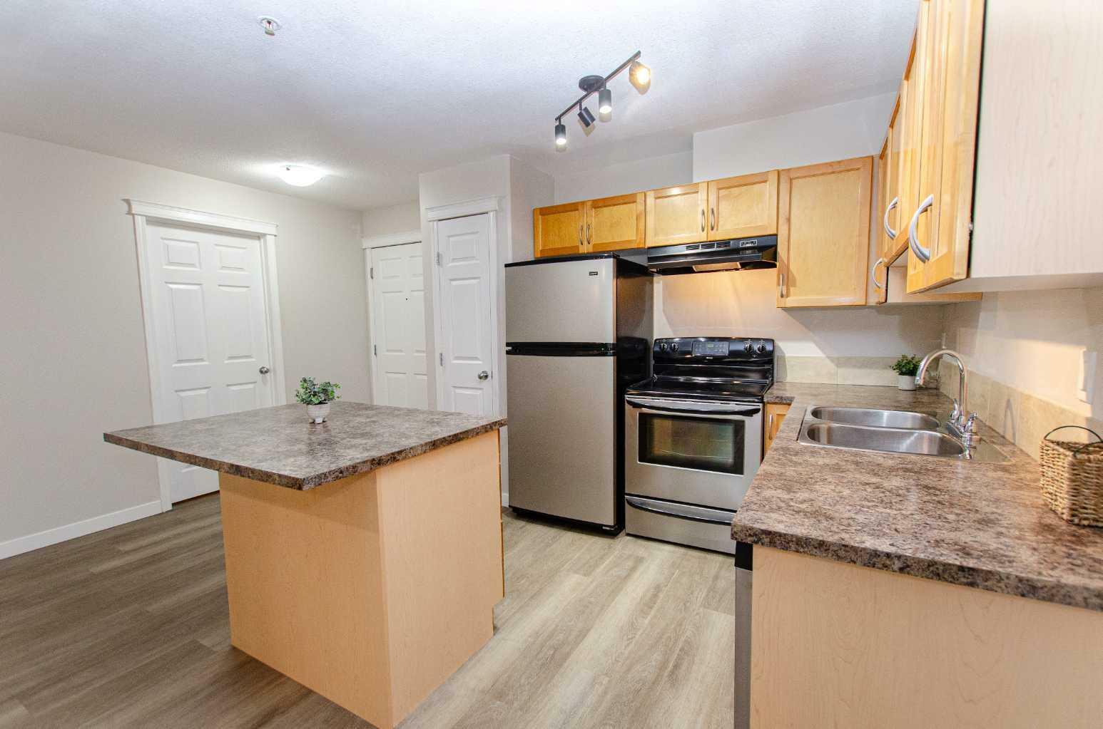 Property Photo: 5601 Kerrywood Drive 212 AB T4N 4X3