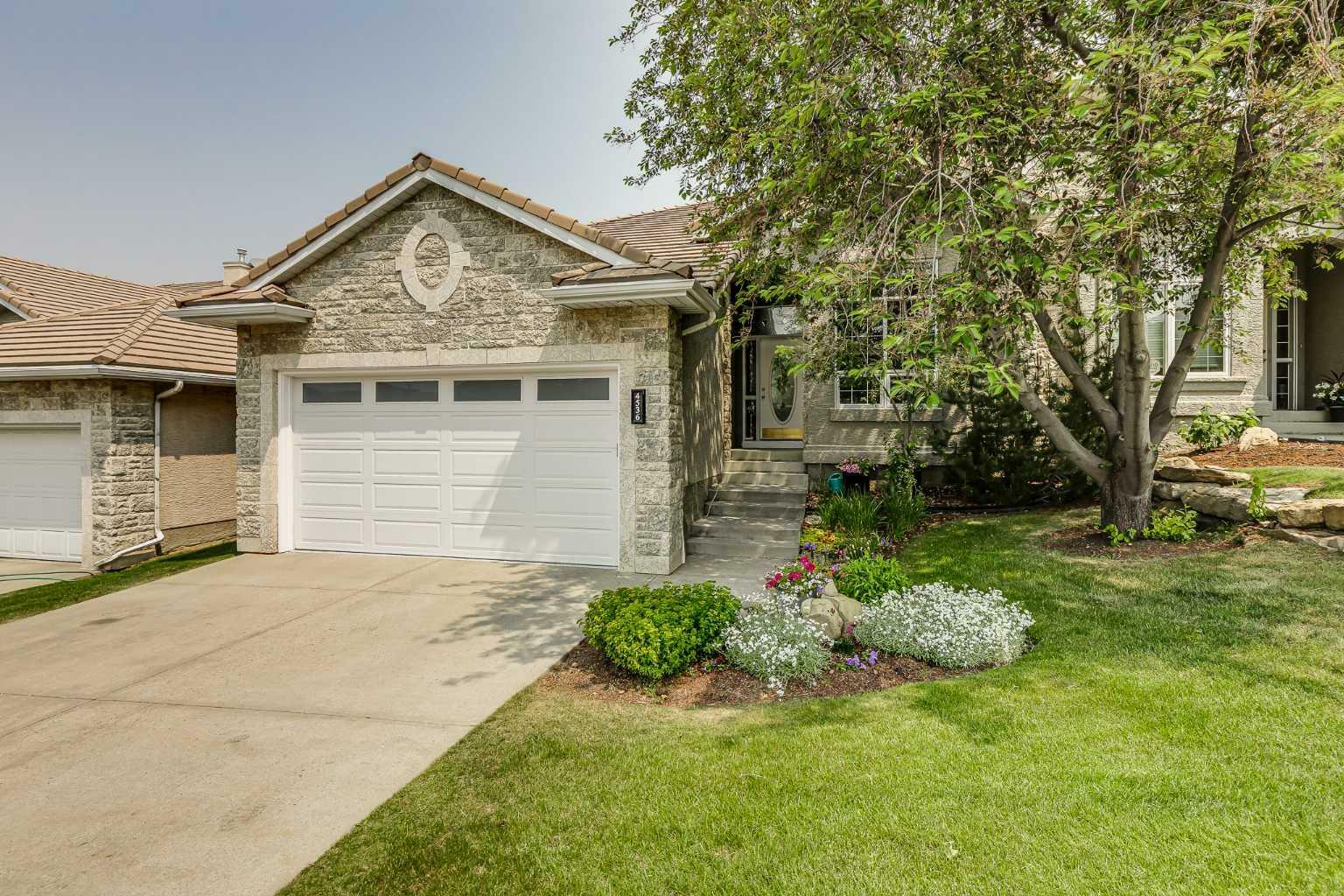 Property Photo: 4536 Hamptons Way NW AB T3A 5H7
