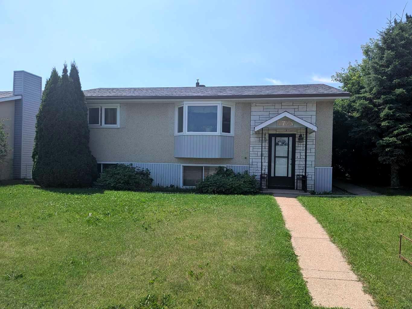 Property Photo: 4723 47 Avenue AB T4L 1T9
