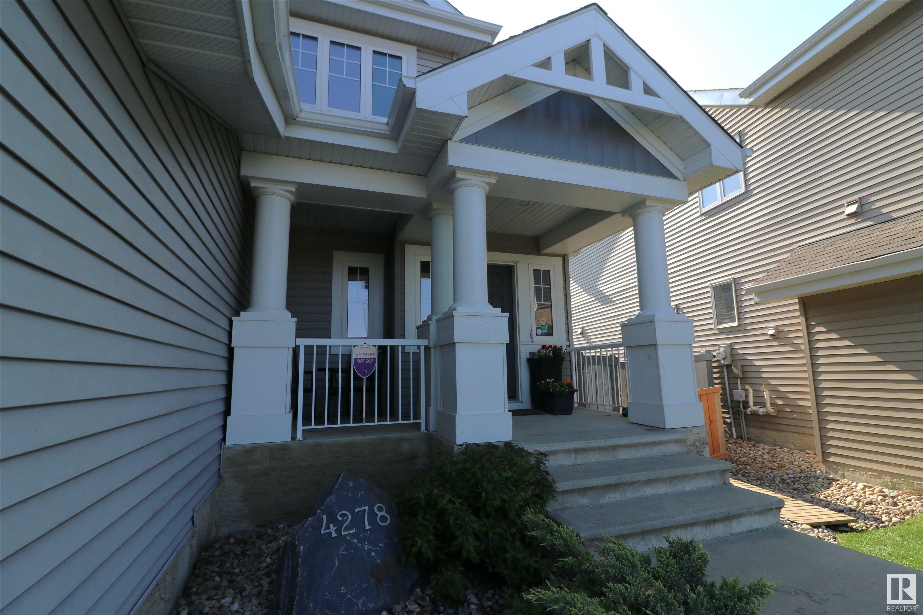 Property Photo: 4278 Savaryn Drive SW AB T6X 0P4