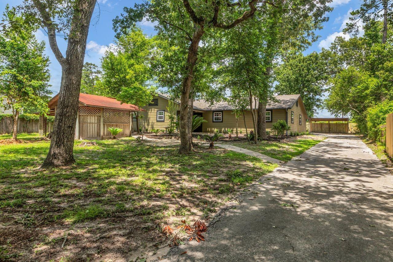 Property Photo: 10650 Forest Creek Drive TX 77318