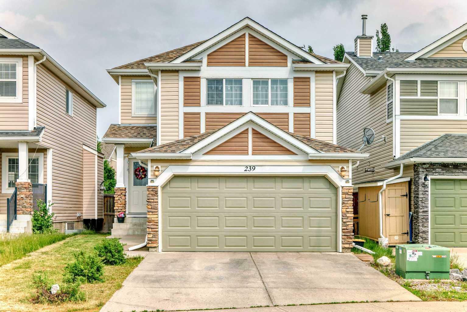 Property Photo: 239 Cougar Plateau Way SW AB T3H 5S2
