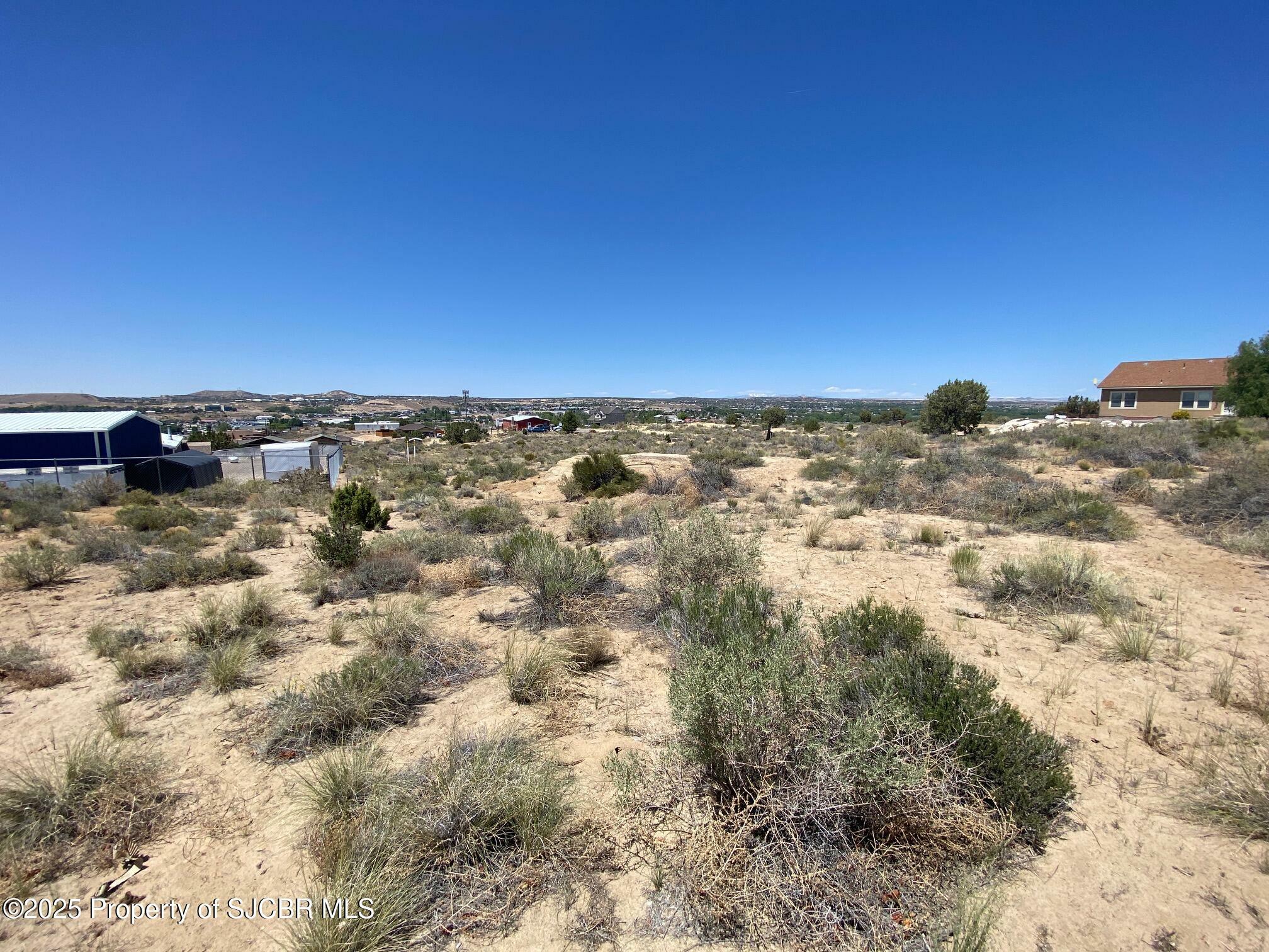 Property Photo: Lots 26-27 .69 Ac Road 34931 NM 87401