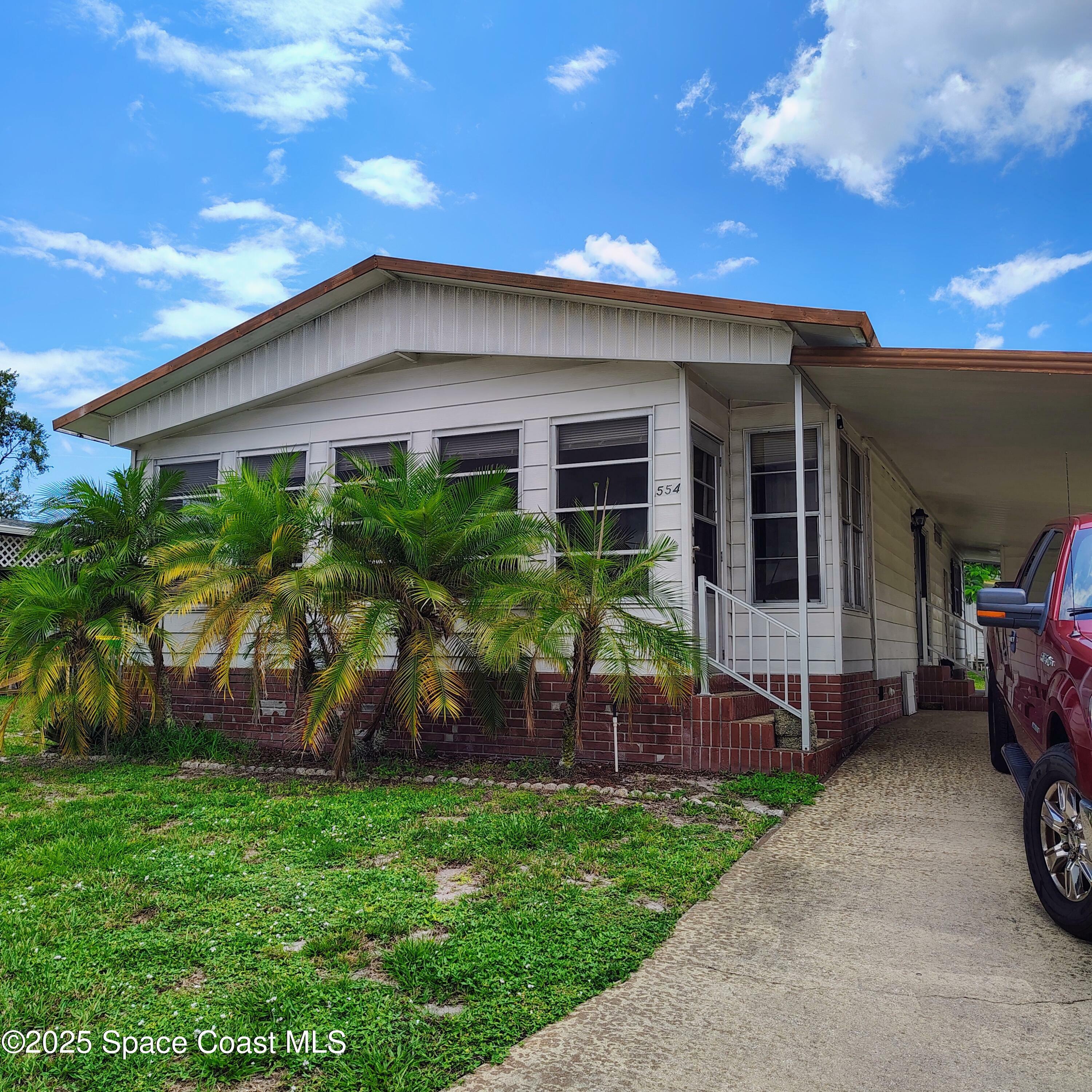 Property Photo: 554 Jennifer Circle FL 32904