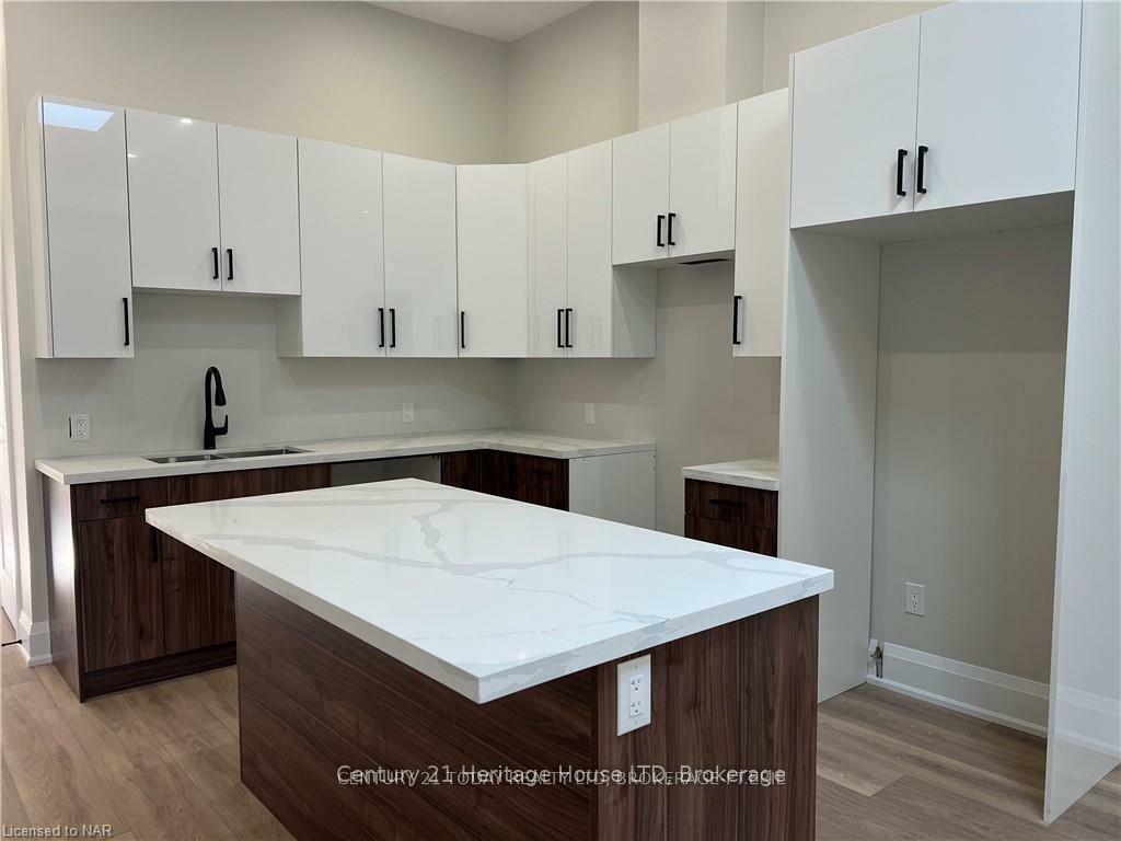 Property Photo: 43 Jarvis Street 202 ON L2A 2S3