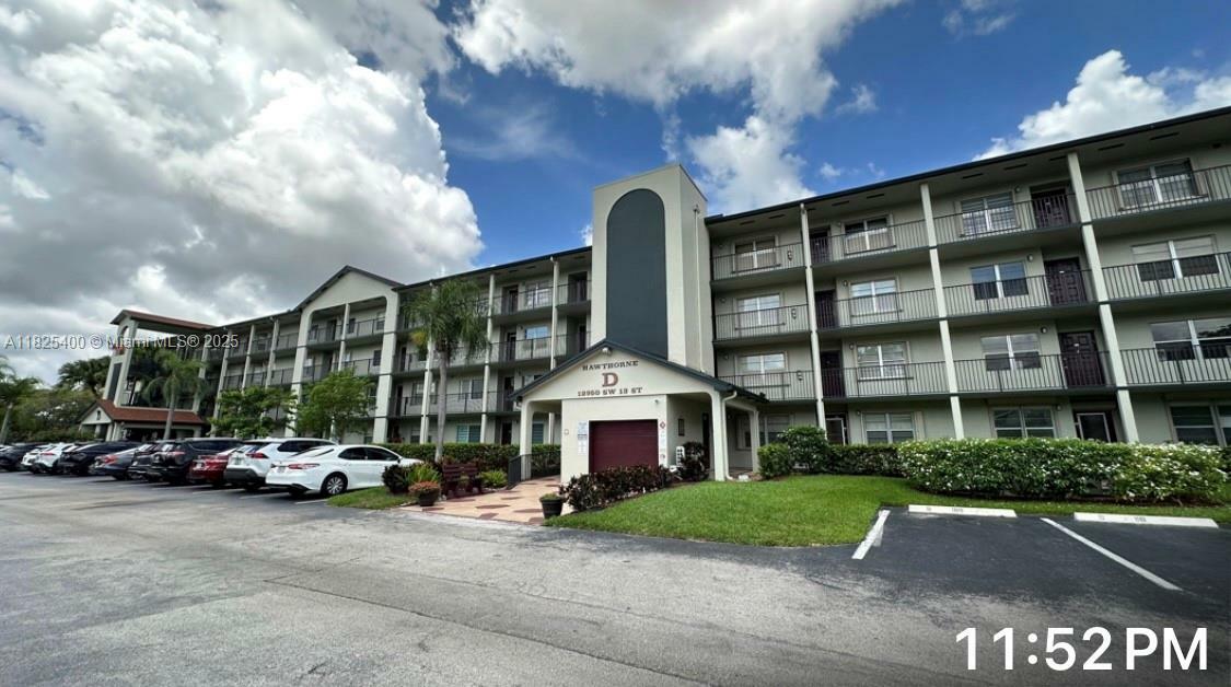Property Photo: 12950 SW 13th St 301D FL 33027