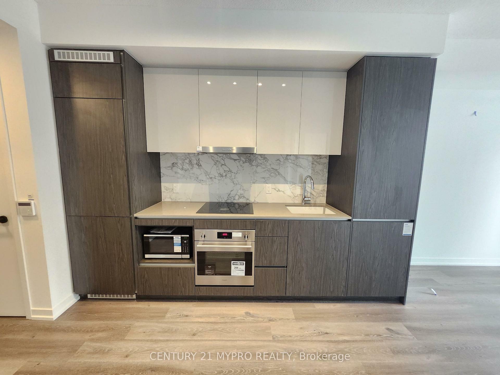 Property Photo: 28 Interchange Way 321 ON L4K 0P8